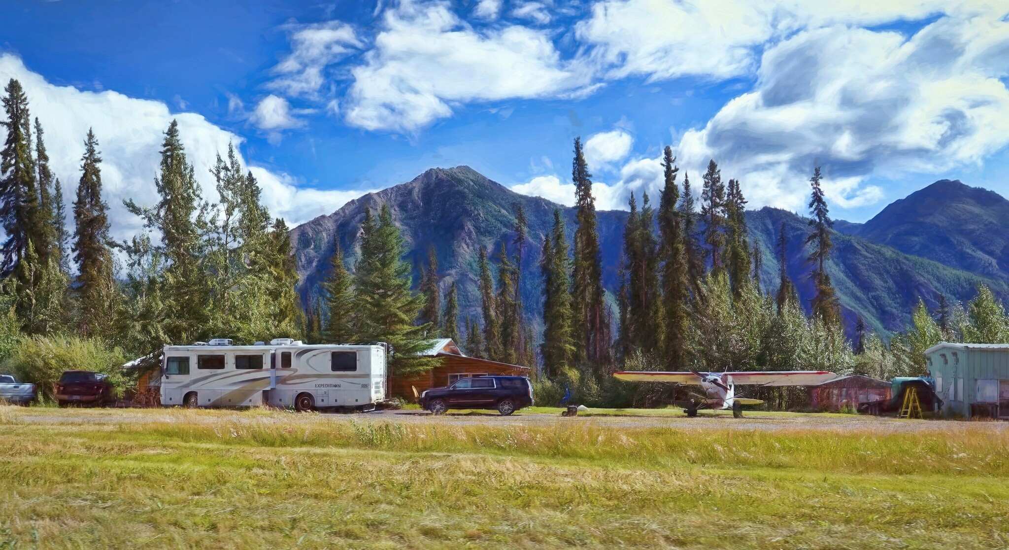 Big RV parked within the mountains of Alaska